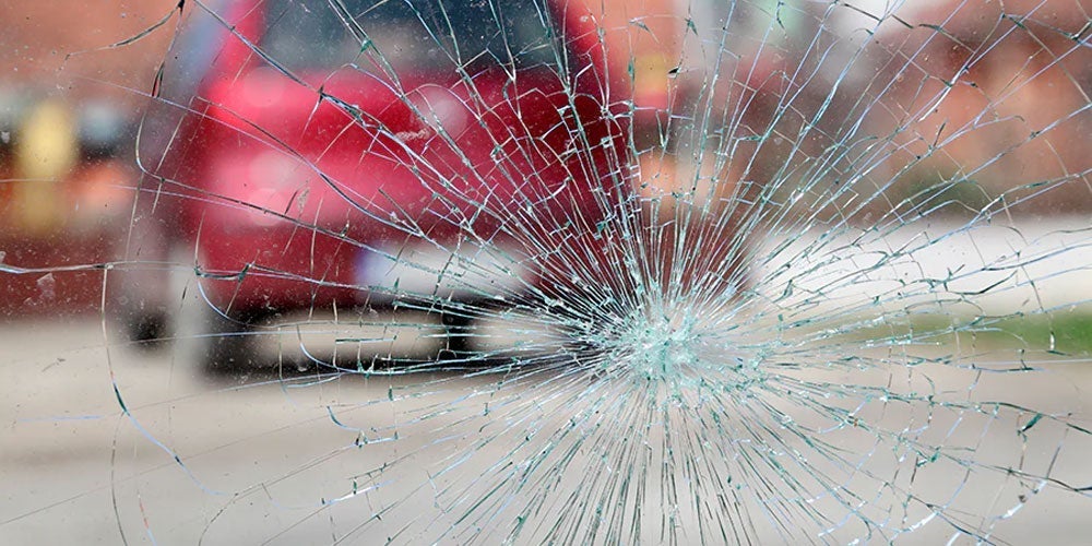 View of windshield with large crack
